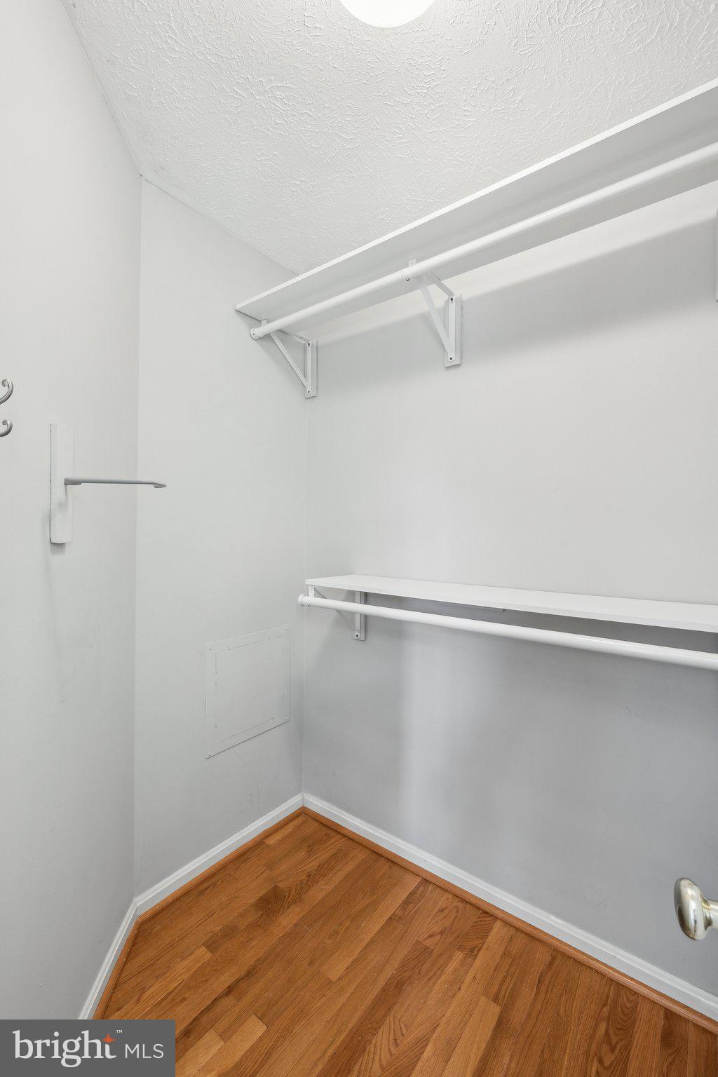 14 St Peters Court Stafford, VA 22556 - Photo 23 of 47 a view of a room with racks on the wall