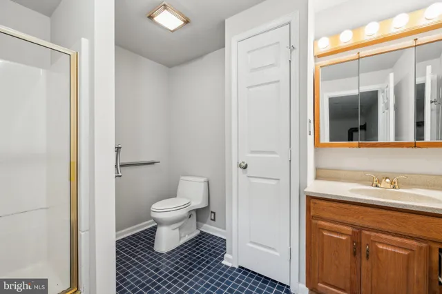 a bathroom with a sink and a toilet