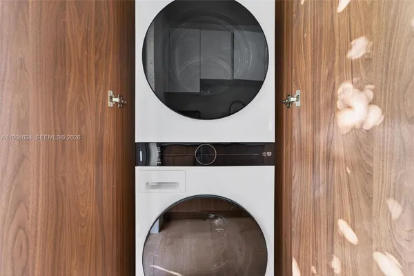 a close view of utility room with washer and dryer