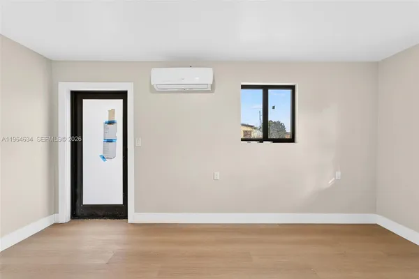 an empty room with windows