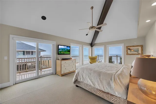 a view of a street with an ocean view