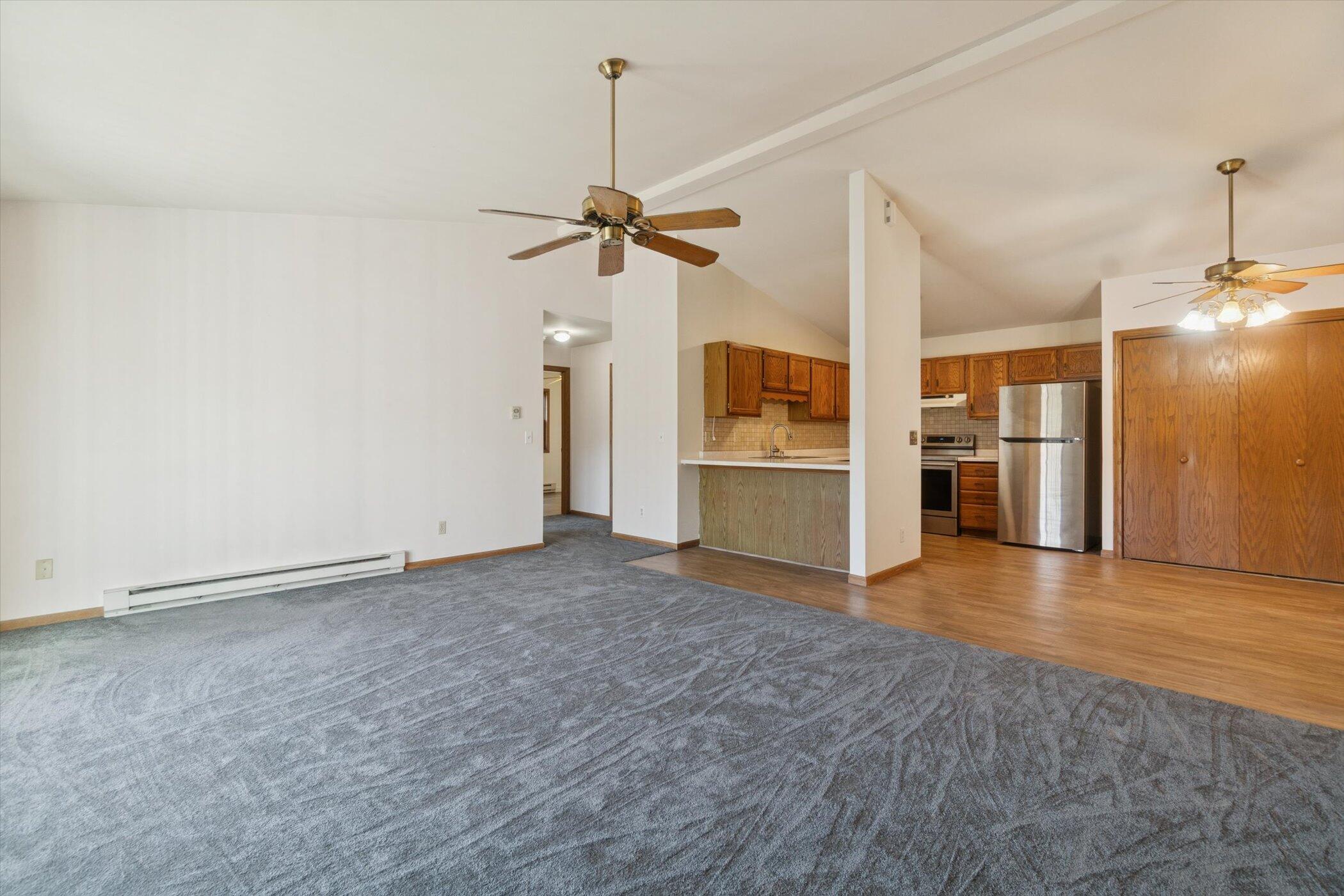 805 Canterberry Court, Unit C West Bend, WI 53090 - Photo 16 of 18 NEW CARPET 2025-Open Concept