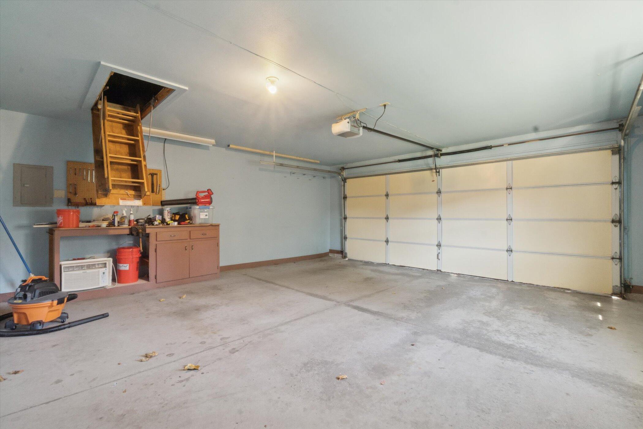805 Canterberry Court, Unit C West Bend, WI 53090 - Photo 9 of 18 2 Car, Workbench, Access to Large Attic Storage for Unit