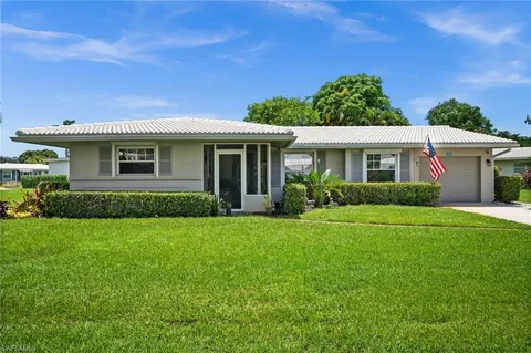 a house view with a garden space