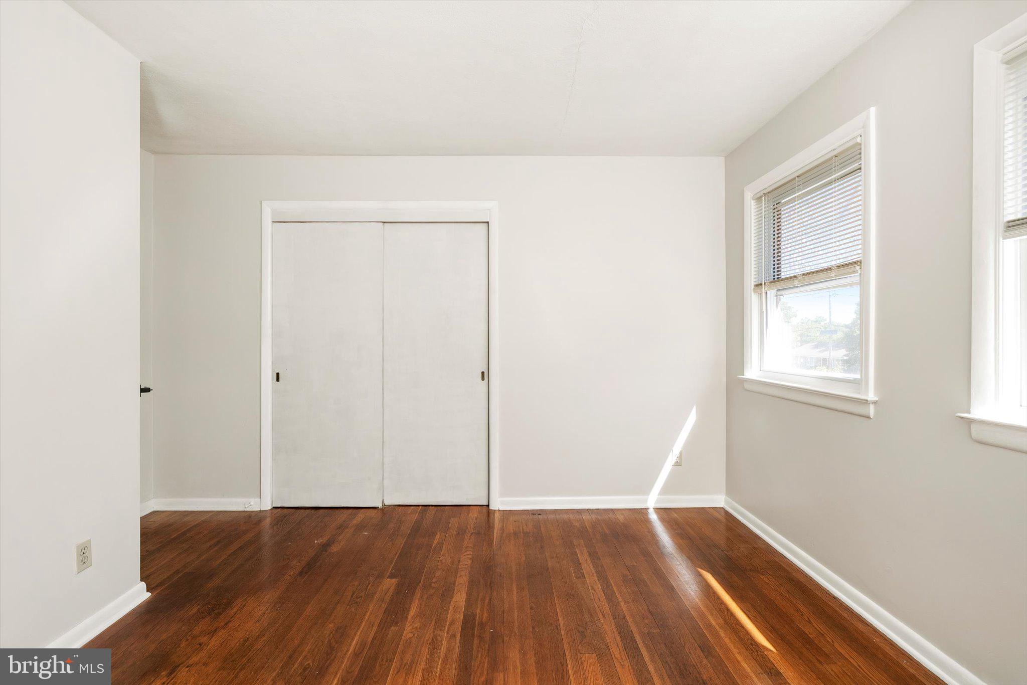 3639 State Extension Trenton, NJ 08619 - Photo 15 of 33 Bright and airy room with hardwood floors.