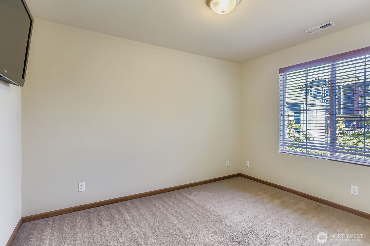 838 4th Avenue Northeast Issaquah, WA 98029 - Photo 16 of 26 a view of an empty room with a window