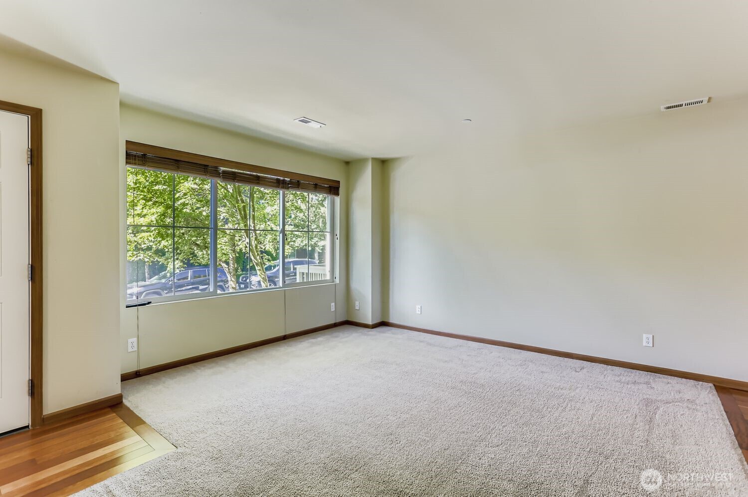 838 4th Avenue Northeast Issaquah, WA 98029 - Photo 6 of 26 an empty room with large windows