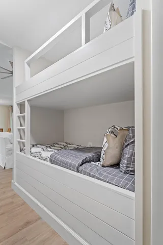a bathroom with a sink and cabinets
