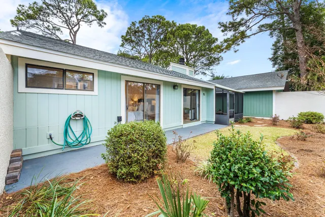a view of a house with a garden