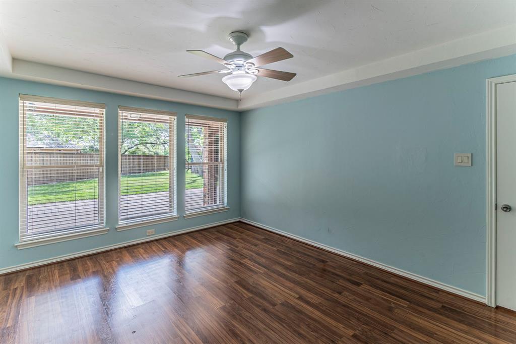 127 Nicklaus Nook Lancaster, TX 75146 - Photo 30 of 37 Empty room featuring dark wood-style floors and ceiling fan