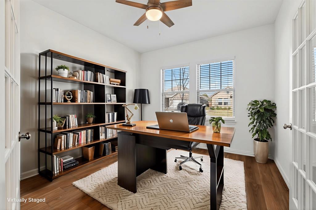 2325 Myrtle Way Melissa, TX 75454 - Photo 21 of 22 a view of a workspace with furniture and a bookshelf