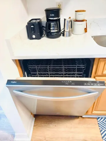 a close view of sink and cabinets