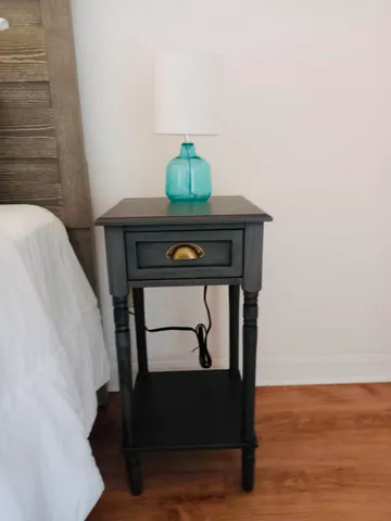 a view of staircase with wooden floor