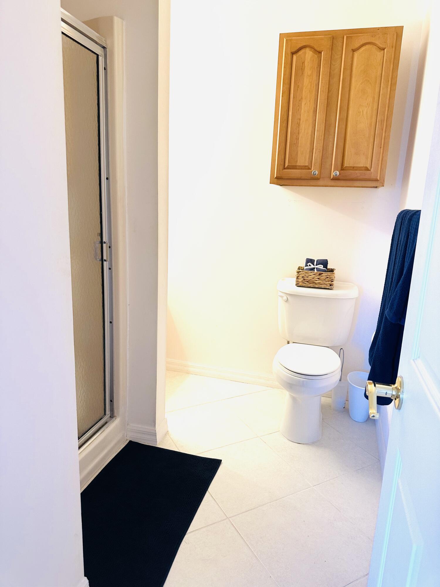 80 Crooked Tree Lane, Unit 106 Vero Beach, FL 32962 - Photo 33 of 47 a bathroom with a toilet