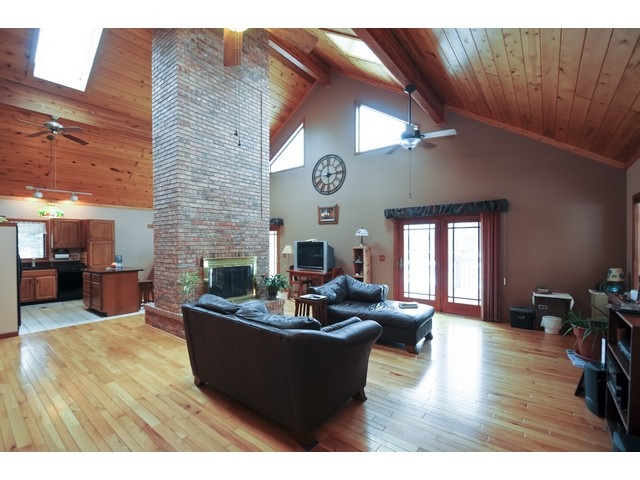 748 Rosedale Terrace Crete, IL 60417 - Photo 3 of 12 a living room with furniture and a fireplace