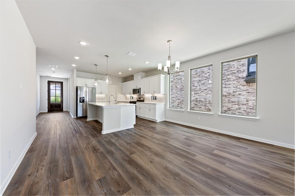 1844 Rosedale Avenue Van Alstyne, TX 75495 - Photo 8 of 26 Adjacent to the kitchen, this lovely dining area is the perfect place for cozy family meals or fun dinner parties!
