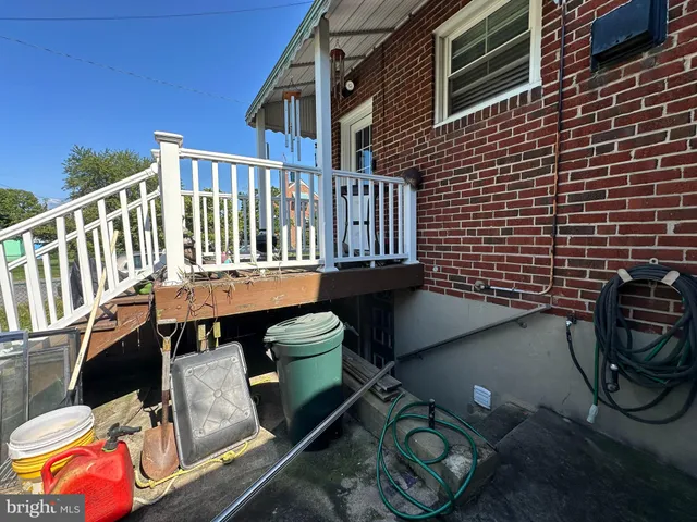 a view of a chairs and table on the deck
