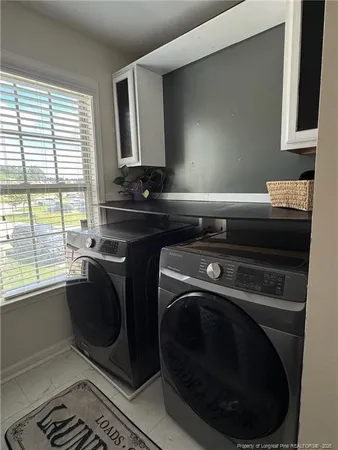 a view of an empty room and fire place