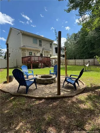 a view of a house with a back yard