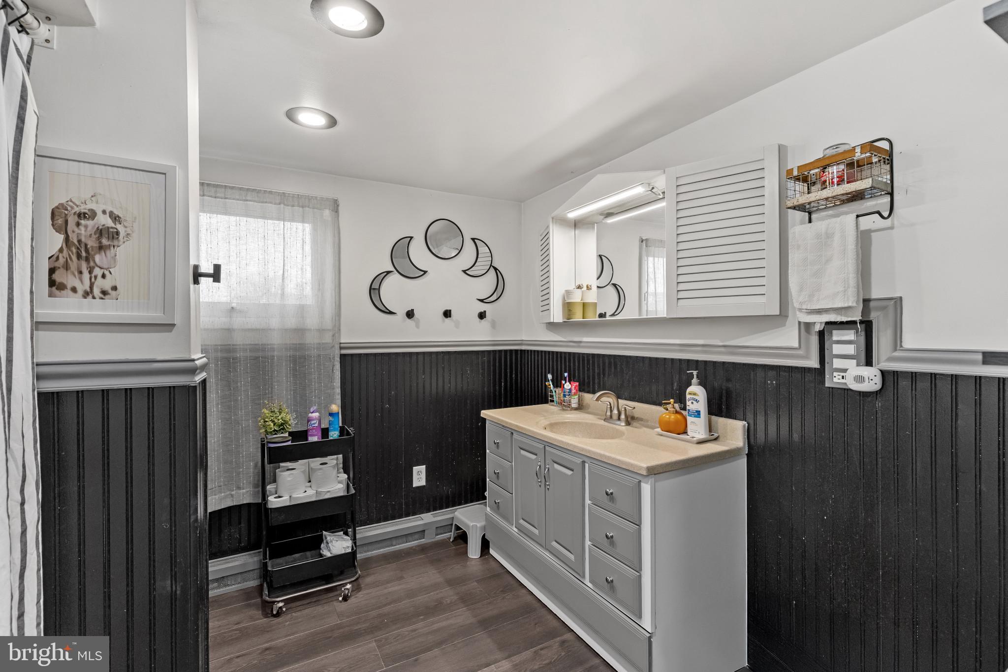 6913 River Drive Road Baltimore, MD 21219 - Photo 26 of 32 a utility room with sink dryer and washer