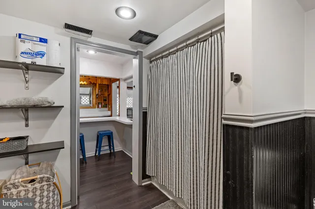 a view of livingroom with furniture and wooden floor
