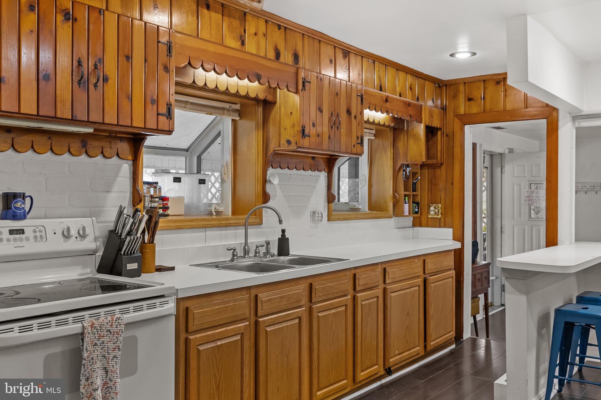 6913 River Drive Road Baltimore, MD 21219 - Photo 7 of 32 a bathroom with a sink and a mirror