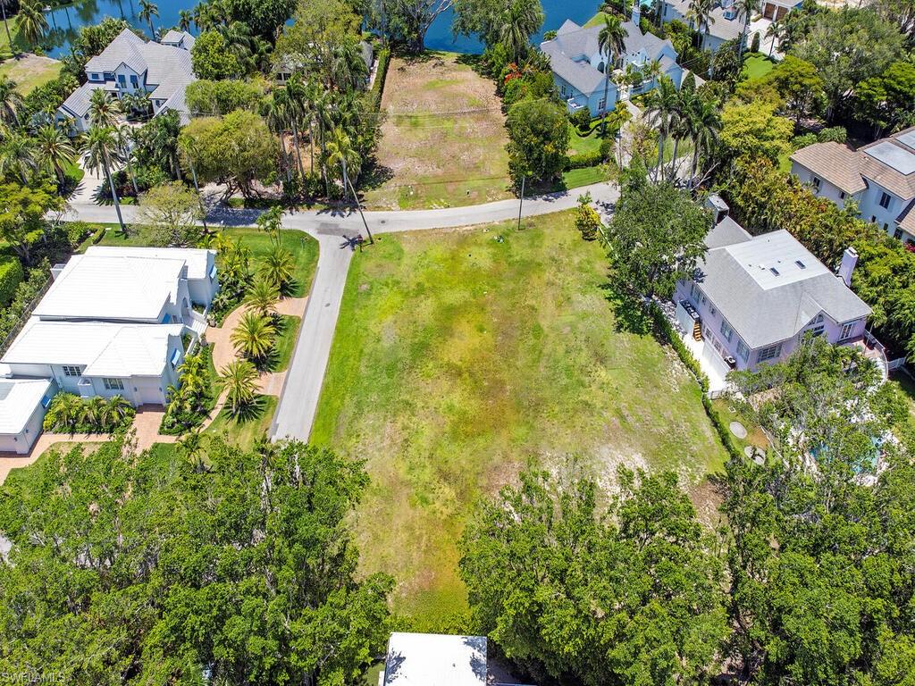2545 Lantern Lane Naples, FL 34102 - Photo 5 of 5 an aerial view of residential houses with yard