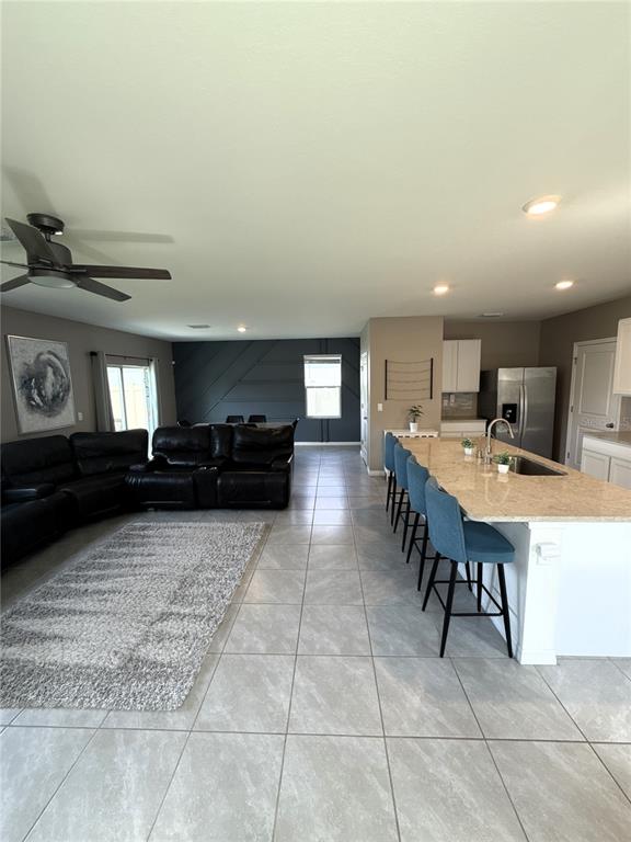 8446 Hardy Bay Loop Wesley Chapel, FL 33545 - Photo 12 of 38 a kitchen with a sink and cabinets
