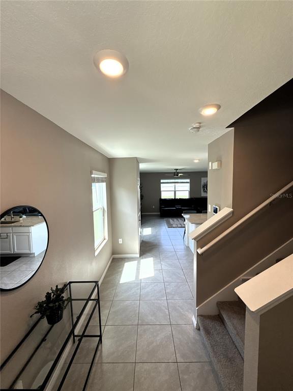 8446 Hardy Bay Loop Wesley Chapel, FL 33545 - Photo 8 of 38 a living room with furniture