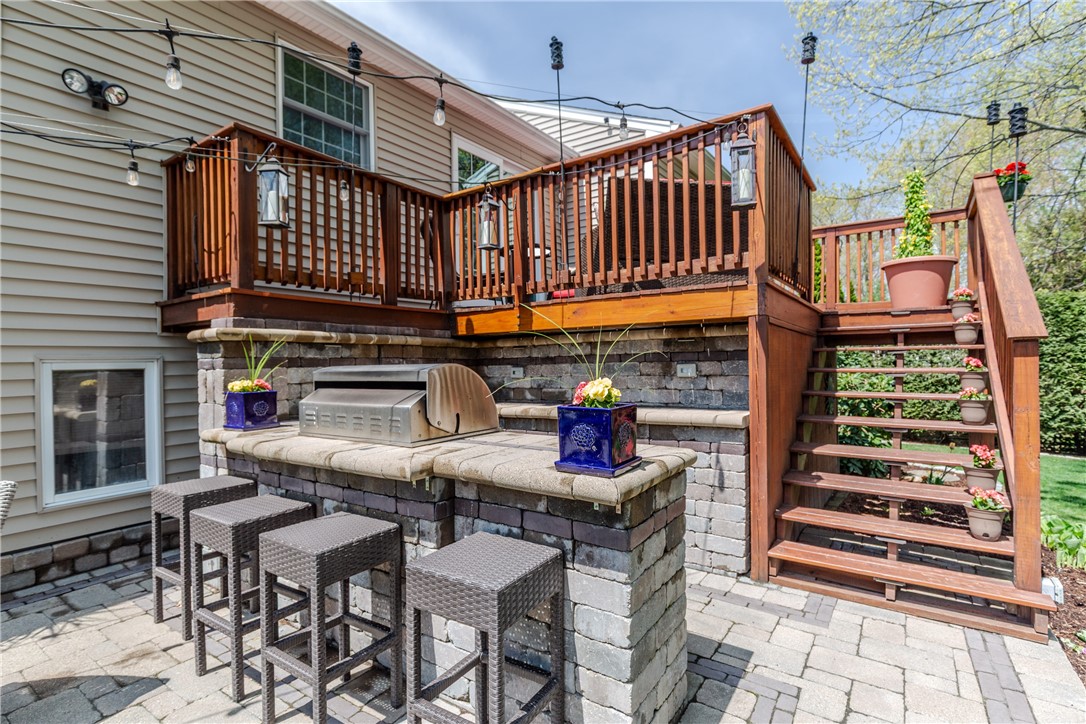 50 Thunder Trail Cranston, RI 02921 - Photo 36 of 49 Deck and outdoor kitchen - beautiful stone work!