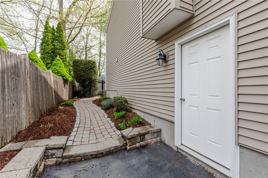 50 Thunder Trail Cranston, RI 02921 - Photo 46 of 49 Walkway to back yard from driveway