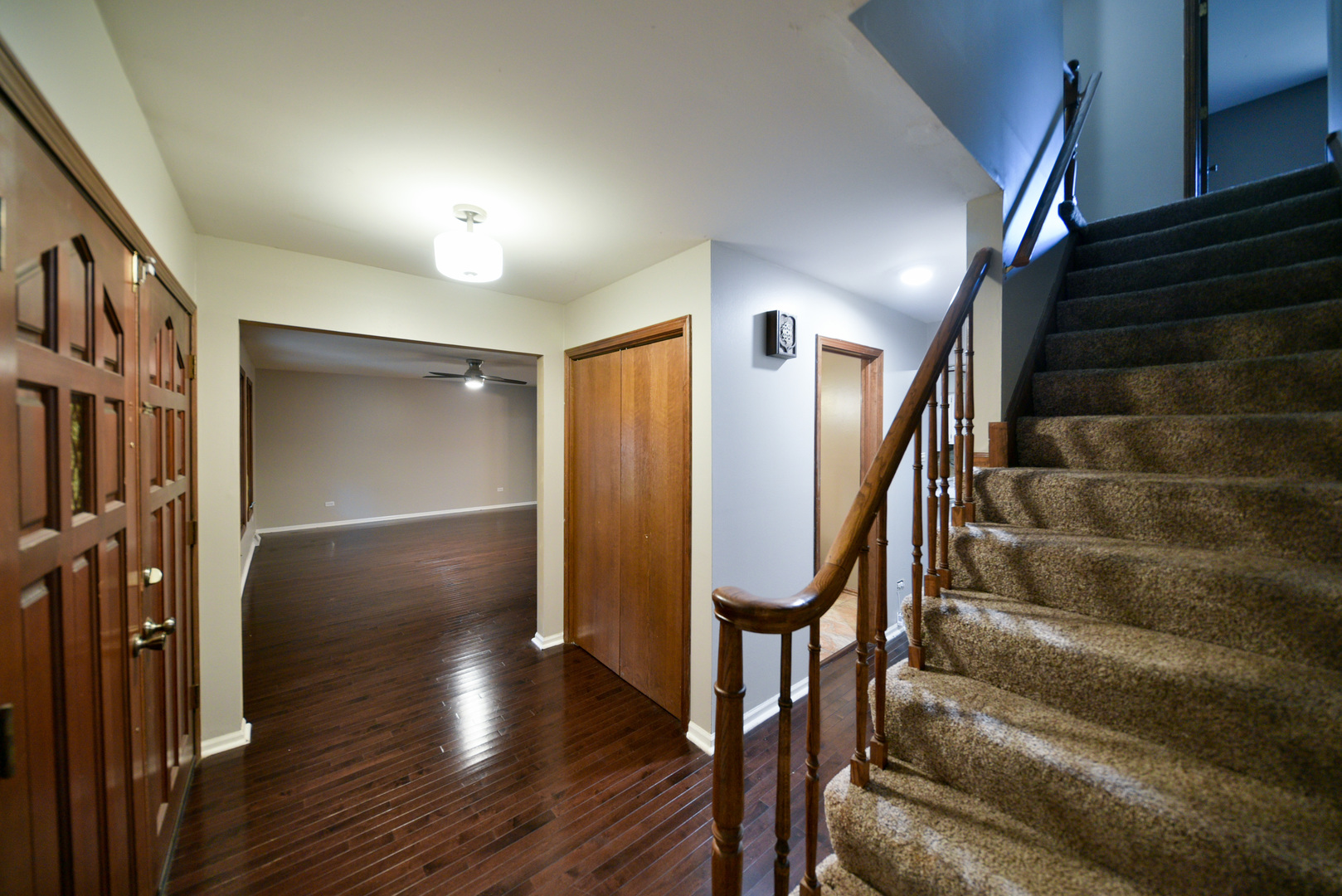 755 Cumnock Road Olympia Fields, IL 60461 - Photo 17 of 34 a view of entryway with wooden floor and stairs