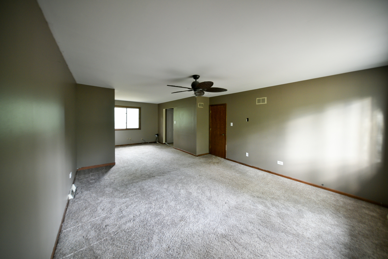 755 Cumnock Road Olympia Fields, IL 60461 - Photo 18 of 34 an empty room with windows and fireplace
