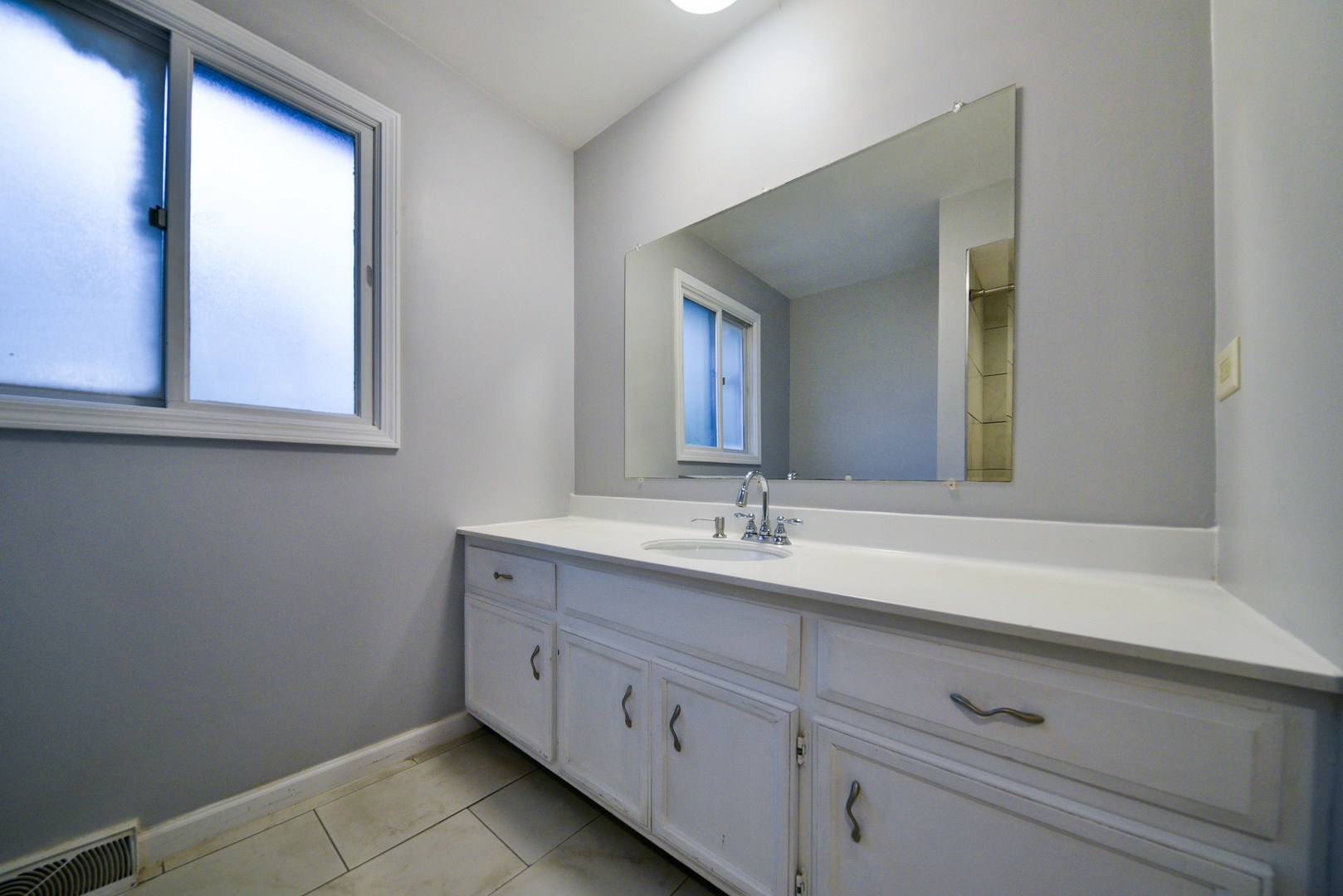 755 Cumnock Road Olympia Fields, IL 60461 - Photo 30 of 34 a bathroom with a granite countertop sink and a mirror
