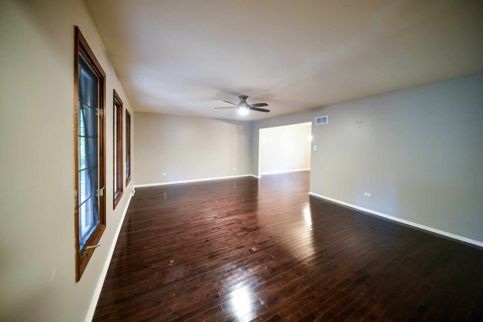 755 Cumnock Road Olympia Fields, IL 60461 - Photo 3 of 34 a view of an empty room with wooden floor