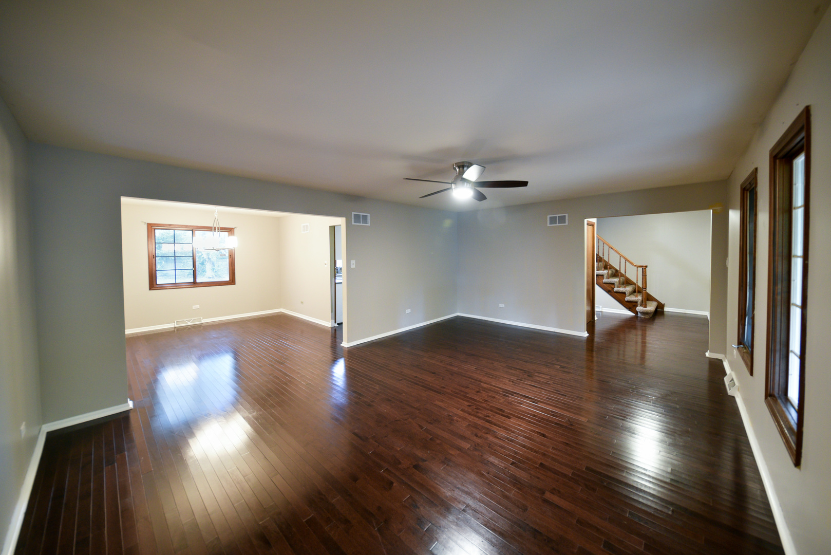 755 Cumnock Road Olympia Fields, IL 60461 - Photo 4 of 34 a view of an empty room with wooden floor and a window