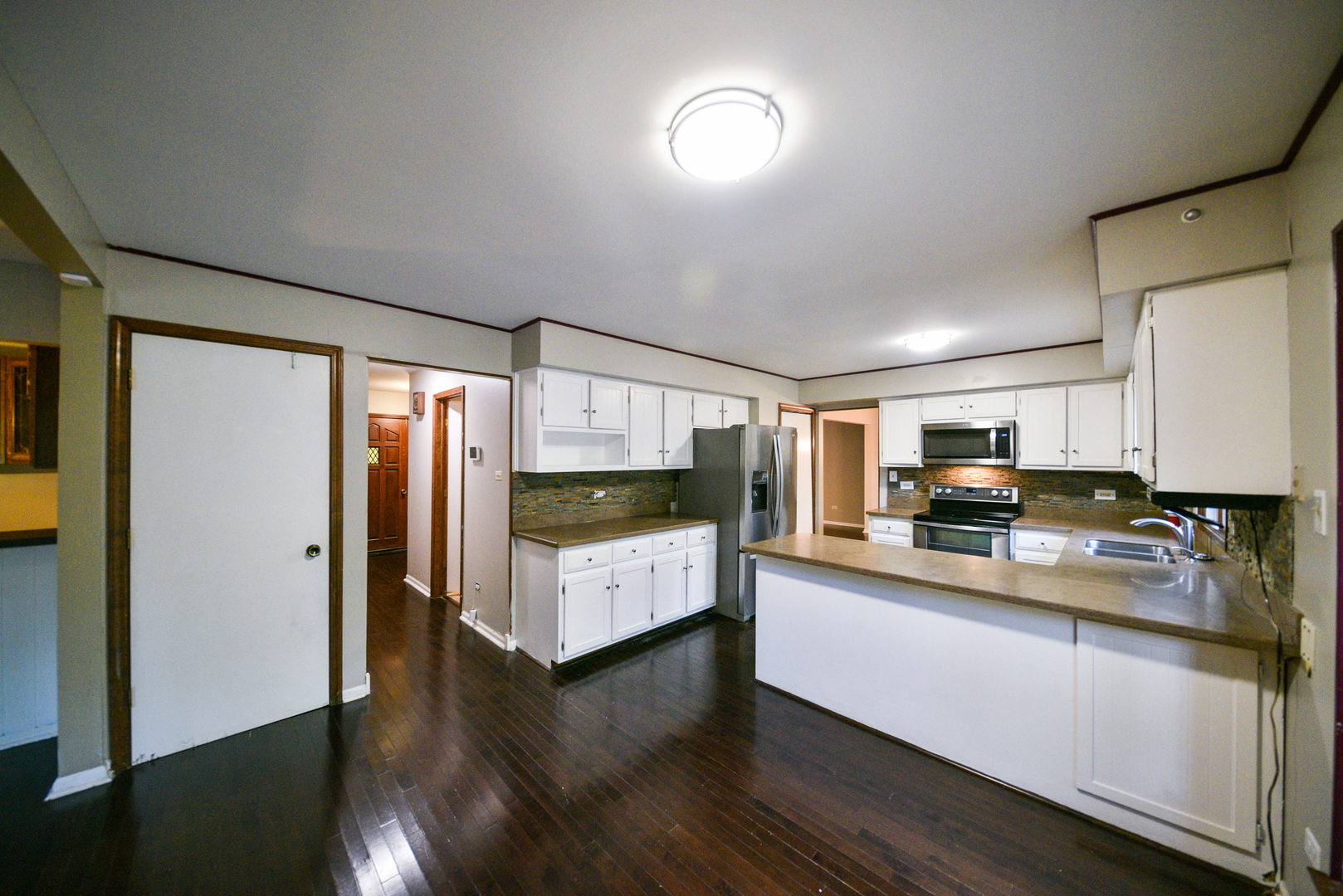 755 Cumnock Road Olympia Fields, IL 60461 - Photo 10 of 34 a kitchen with stainless steel appliances a refrigerator sink and microwave