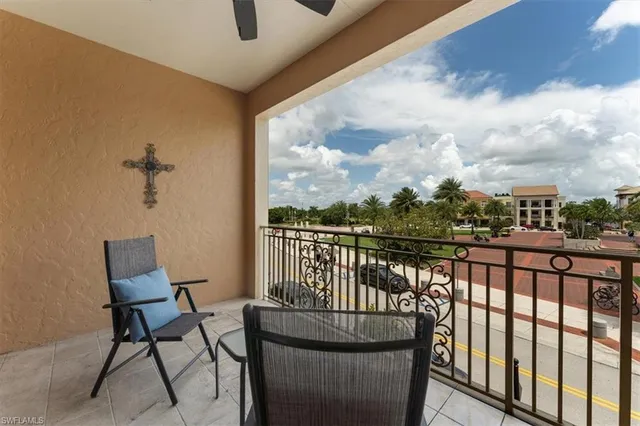a view of a balcony with furniture
