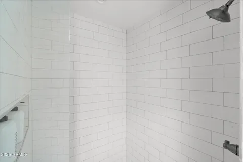 a bathroom with a white shower