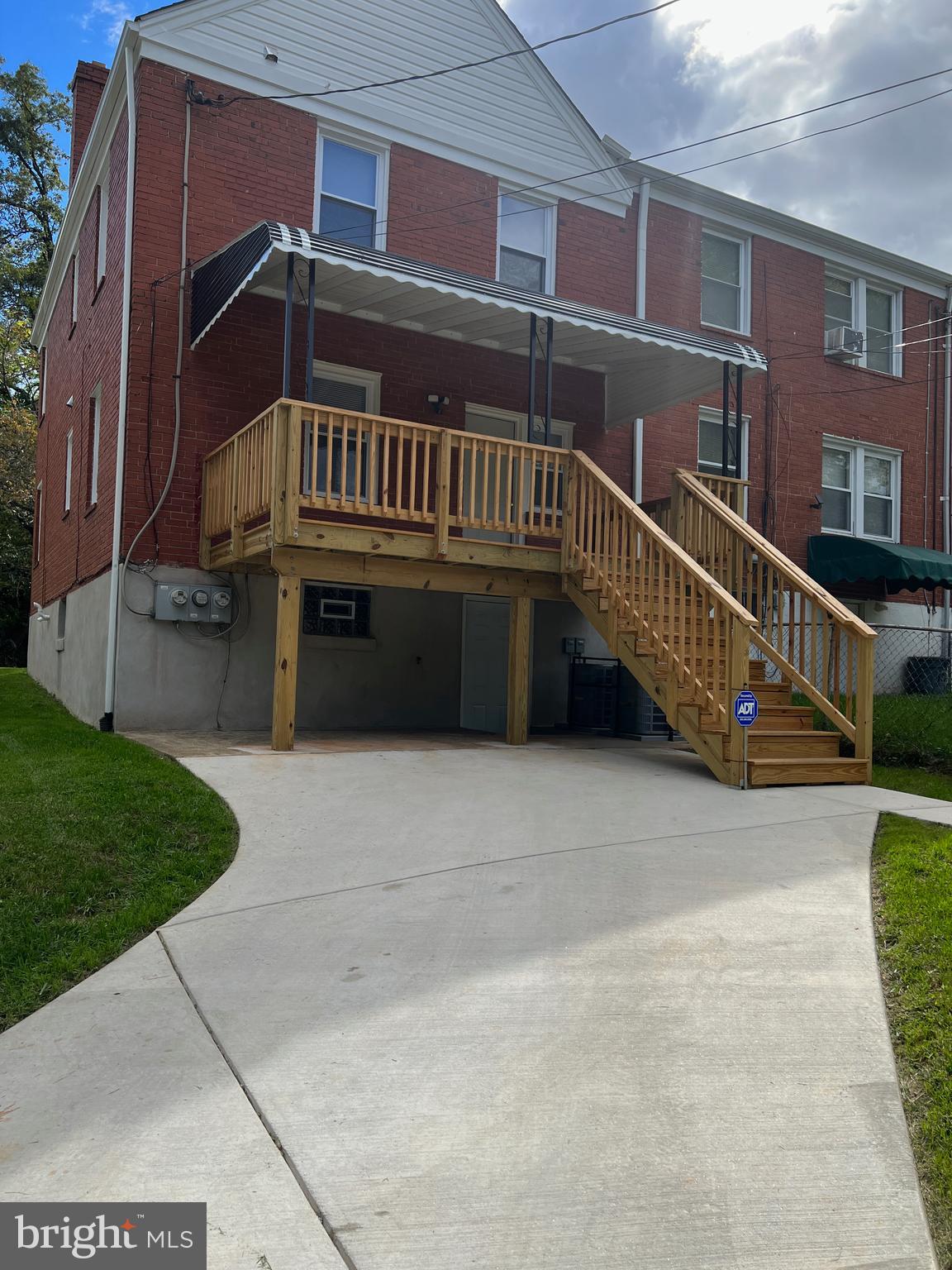 4064 Edgewood Road Baltimore, MD 21215 - Photo 6 of 26 Rear deck and driveway
