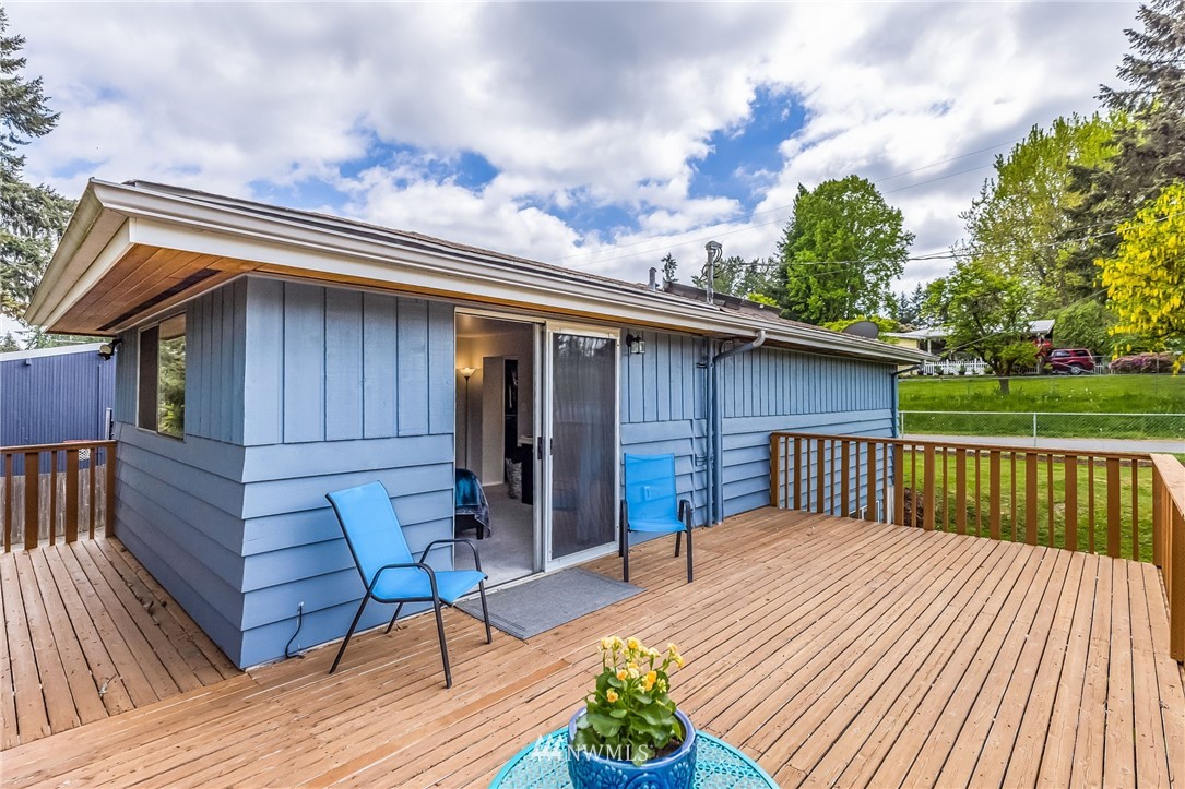 16204 Southeast 132nd Street Renton, WA 98059 - Photo 15 of 38 a roof deck with wooden floor and barbeque oven