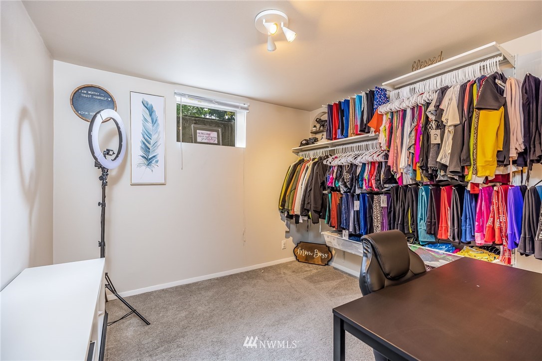 16204 Southeast 132nd Street Renton, WA 98059 - Photo 22 of 38 a view of walk in closet with clothes