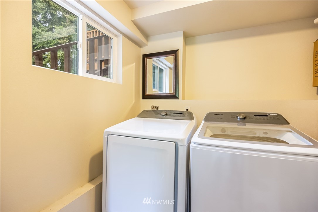 16204 Southeast 132nd Street Renton, WA 98059 - Photo 26 of 38 a utility room with dryer and washer