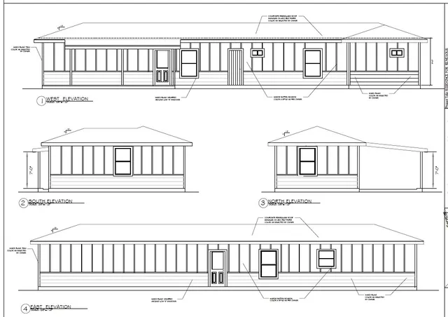 a black and white photo of a living room