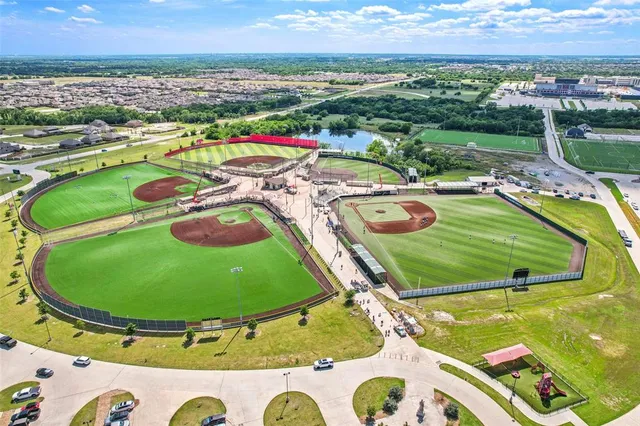 a view of yard with swimming pool and outdoor seating