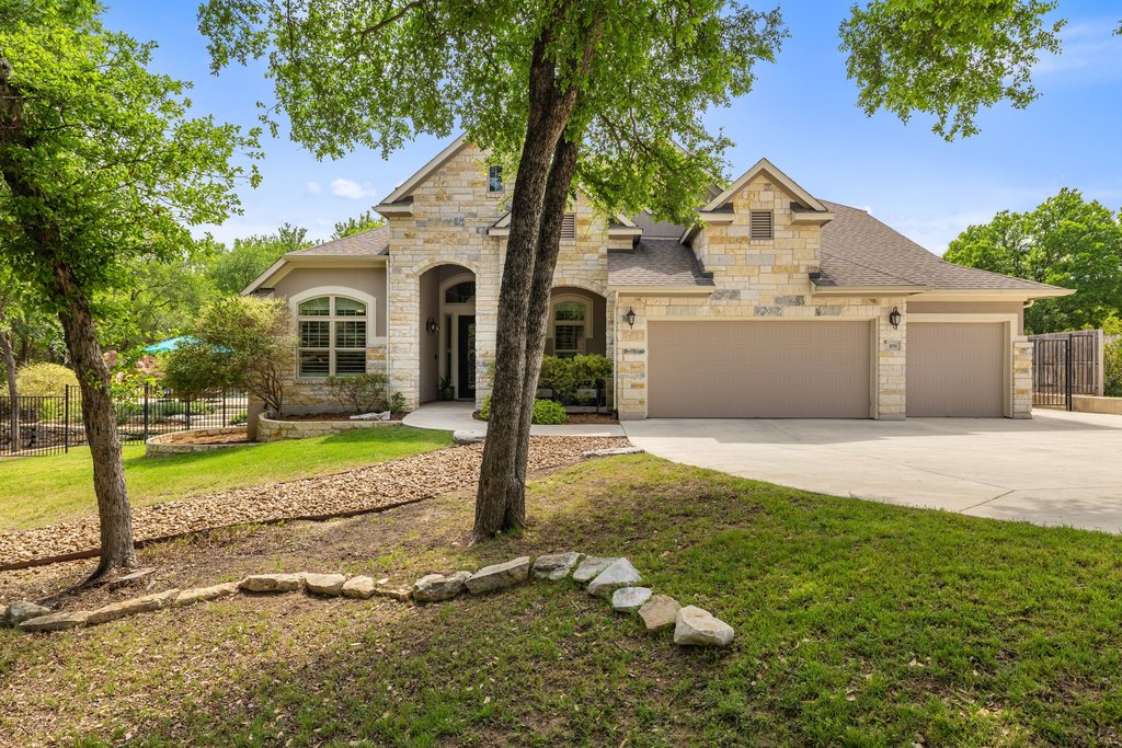 108 Berry Cove Georgetown, TX 78628 - Photo 3 of 39 a front view of a house with a yard
