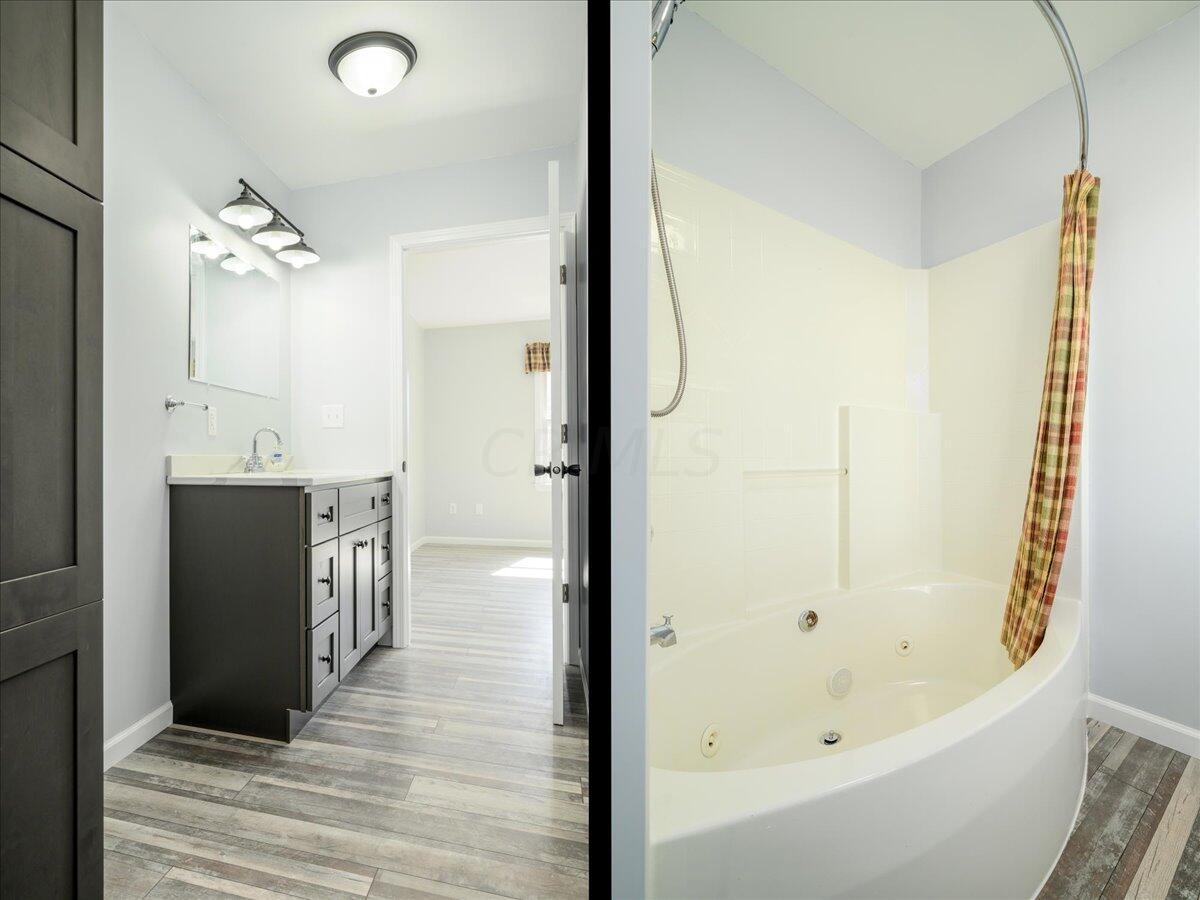 8255 Chillicothe Lancaster Road Southwest Amanda, OH 43102 - Photo 63 of 64 58-Combined Primary Bath Vert