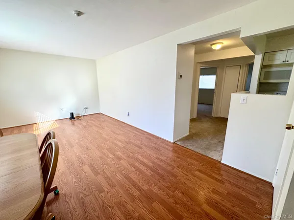 a view of livingroom with furniture and wooden floor
