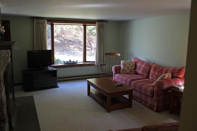 54 Route 149 Marstons Mills, MA 02648 - Photo 3 of 14 a living room with furniture and a flat screen tv