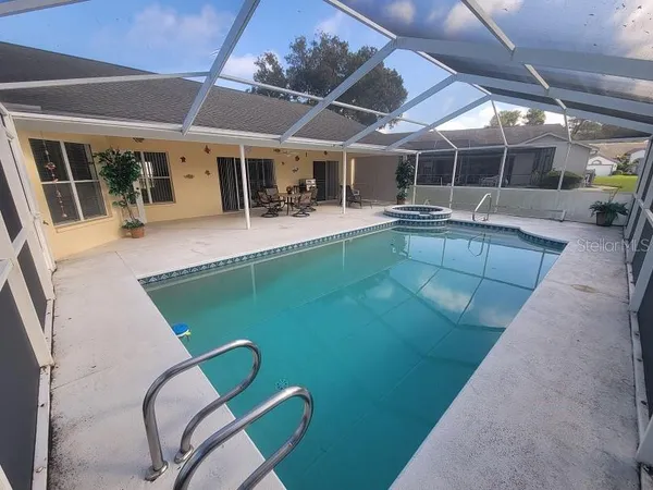 a view of outdoor space with swimming pool